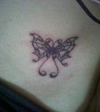 Tribal Butterfly On Inner Hip Tattoo