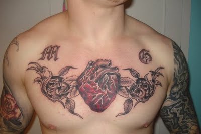 Swirly Leaves and Heart Chest Piece Tattoo Design for Men