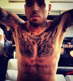 Chris Brown New Tattoo Of Fighter Jet