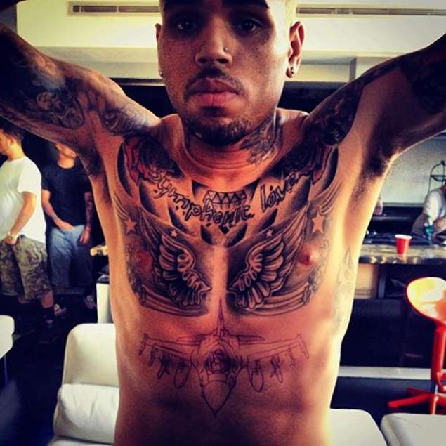 Chris Brown New Tattoo Of Fighter Jet