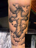 Art Clouds and Cross Tattoo Design for Men