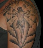 Jesus In Clouds Arm Tattoo Design