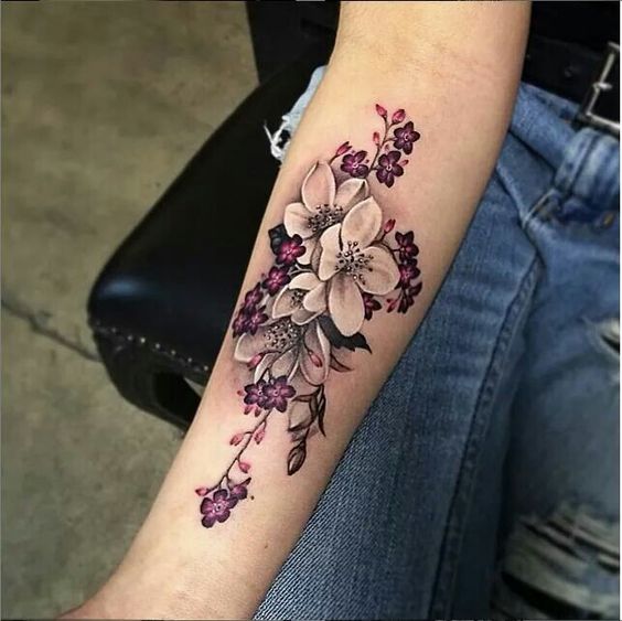 colorful arm flower tattoo