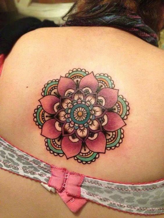 colorful mandala style flower tattoo