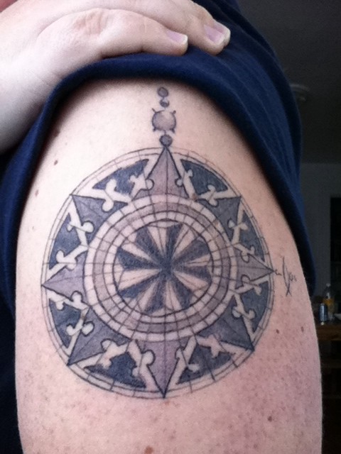 Attic Compass Tattoo Ideas on Upper Arm