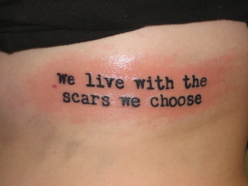 Rib-cage “Life Scars” Life Quote Tattoos for Women
