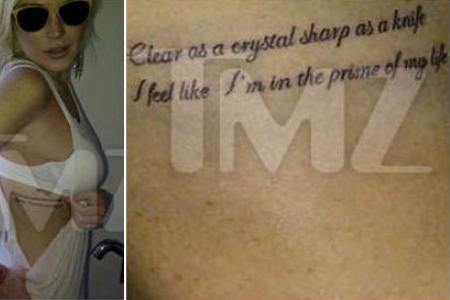 Lindsay Lohan’s Side Rib Quote Tattoo Design