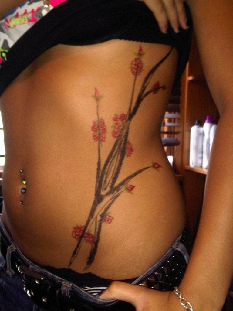 Tattoos For Women: Minimalistic Root Left-Side Belly Tattoo