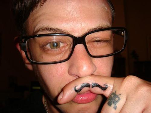 Funny Mustache Tattoo on Pointer Finger Side