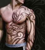 Cool Tribal Tattoo Placement Idea at Front For Guys