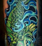 Big Green Colored Koi Coy Fish Tattoo Sample Photo