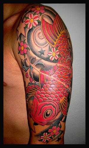 Big Red Colored Koi Coy Fish Tattoo Design on Left Arm