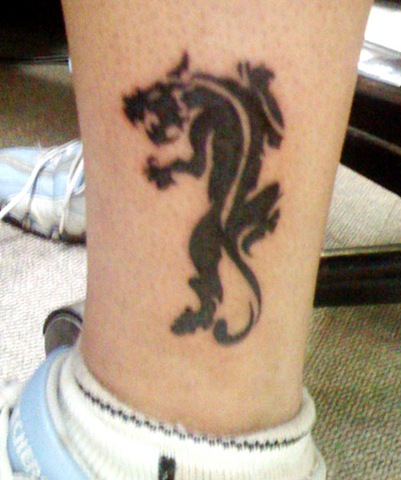 cool panther tattoo leg