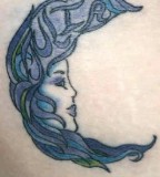 Women Face Crescent Moon Tattoo