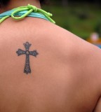 Prestigious And Creative Cross Tattoo Design for Back