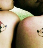 Small Mickey And Minnie Mouse Couple Tattoo