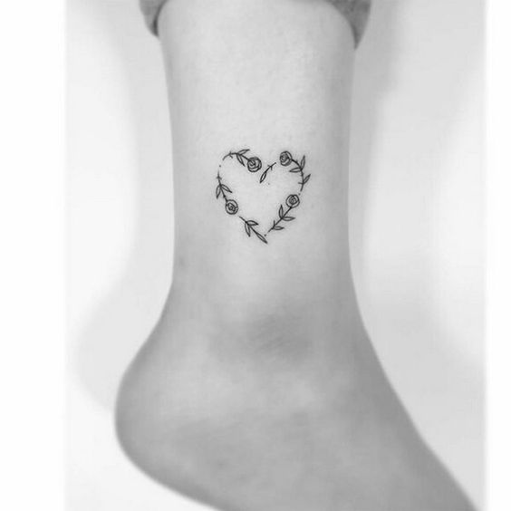 cute rose on ankle flower tattoo