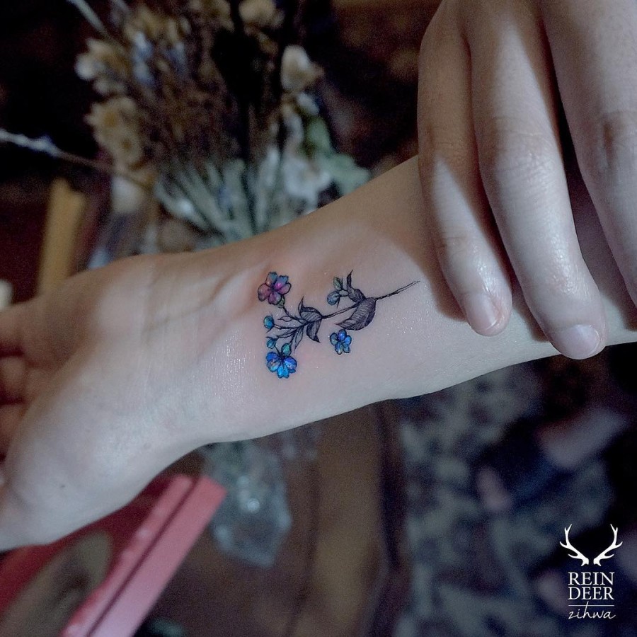 dainty-blue-flower-tattoo