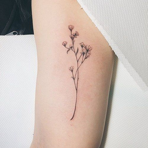 dainty flower tattoo