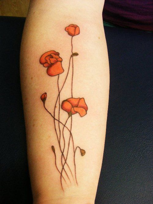 dainty poppy forearm tattoo