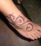 Exotic Swirly Stars Foot-Tattoo Ideas for Women - Star Tattoos