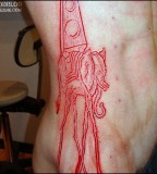 Red Dali Elephant Cutting Tattoo Design for Men and Women
