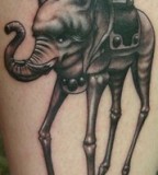 Elegant Identity Dali Elephant Tattoo by Ben Rettke