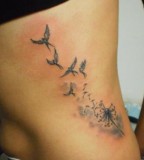 Birds And Dandelion Tattoo Designs On Ribs [NSFW]
