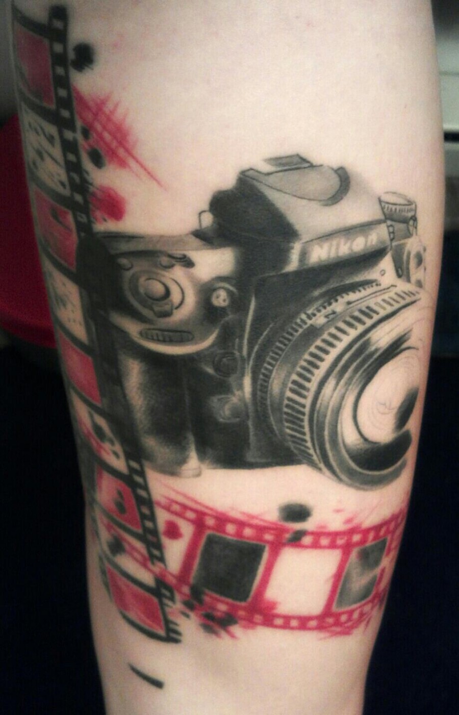 Awesome Camera and Roll Tattoo Art