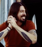Fantastic Dave Grohl Feather Tattoo with Red Shirt Combination 
