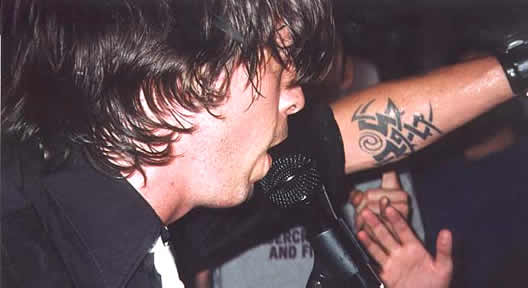 Dave Grohl Tattoos on His Left Forearm Seen On His Perform