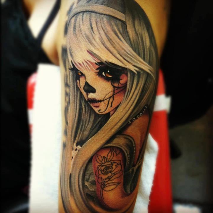 Dead Blonde Doll Tattoo Design on Upper Arm