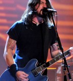 Dave Grohl's Tattoo Seen When Playing Guitar