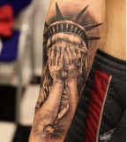 Statue Of Liberty Tattoo Design On Sleeve