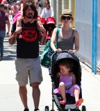 Dave Grohl's Feather Tattoo on His Forearm