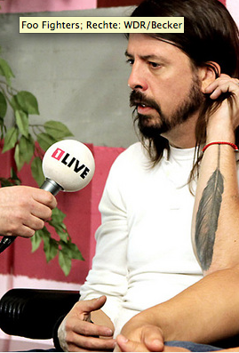 Dave Grohl Feather Tattoo Seen On His Interview