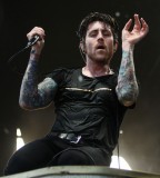 Davey Havok Arm Tattoos while Performing on Stage