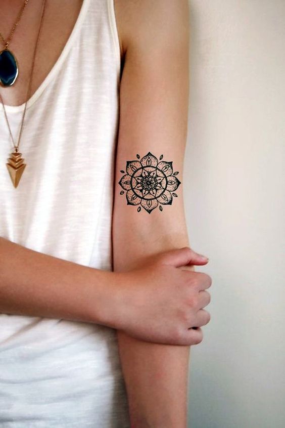 delicate mandala tattoo