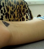 Small Diamond Shaped Tattoo on Wrist for Women