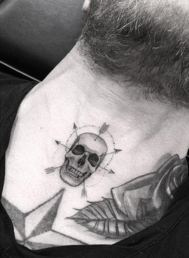 _dr_woo-arrows-skull-tattoo
