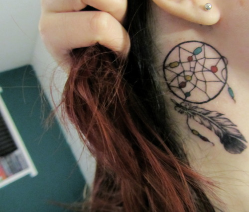 Girl With Picturesque Dream Catcher Tattoo Design On Neck