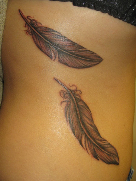 Eagle Feather Tattoos on Hip for Women