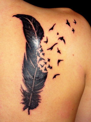 Feather Tattoo Morphing into Black Birds Tattoo Design