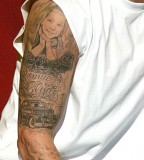 Eminem's Upper Sleeve Tattoo: The Daughter and Bonnie and Clyde Inspired Tattoo