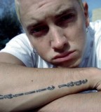 Fatherhood Tattoo: Eminem's Daughter Name on His Right Forearm