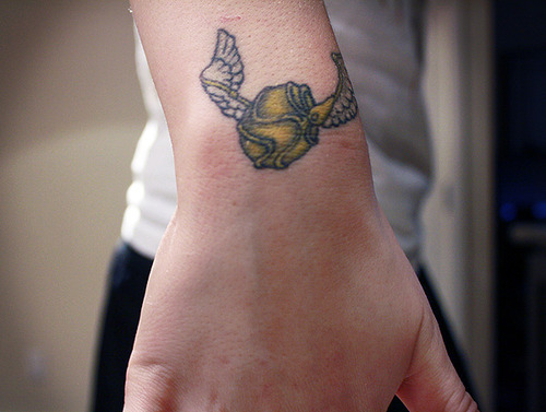 Cool Harry Potter Wings Symbol Tattoo on Upper Wrist
