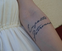 Cute Cursive writing of Expecto Patronum Spell on inner Lower Arm