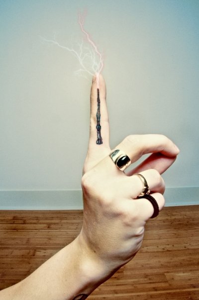 Cool Magic Stick Tattoo on Side Pointer Finger