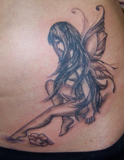 Tribal Cute Fairy Shaped Tattoo Design Photo