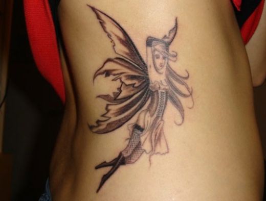 Fairy Shaped Girls Rib Tattoo Design Picture